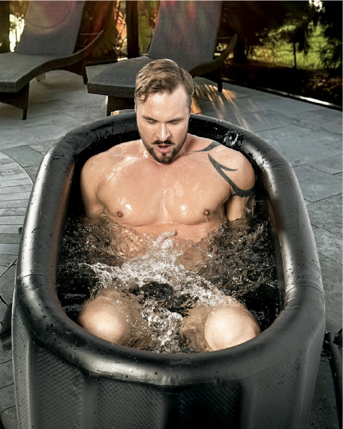 a man enjoy her ice bath